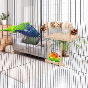 Birds in a cage with a wooden perch and decorative elements at Pet Servo