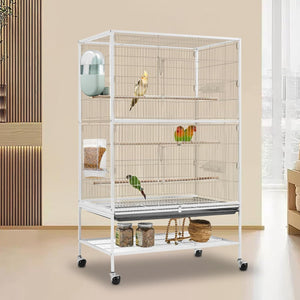 Bird cage with birds inside in a room setting at Pet Servo
