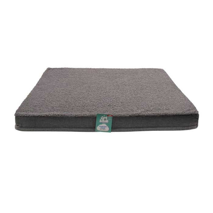Gray pet bed with a visible brand tag on a white background