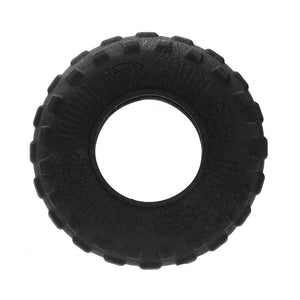 Black tire-shaped dog toy on a white background at Pet Servo