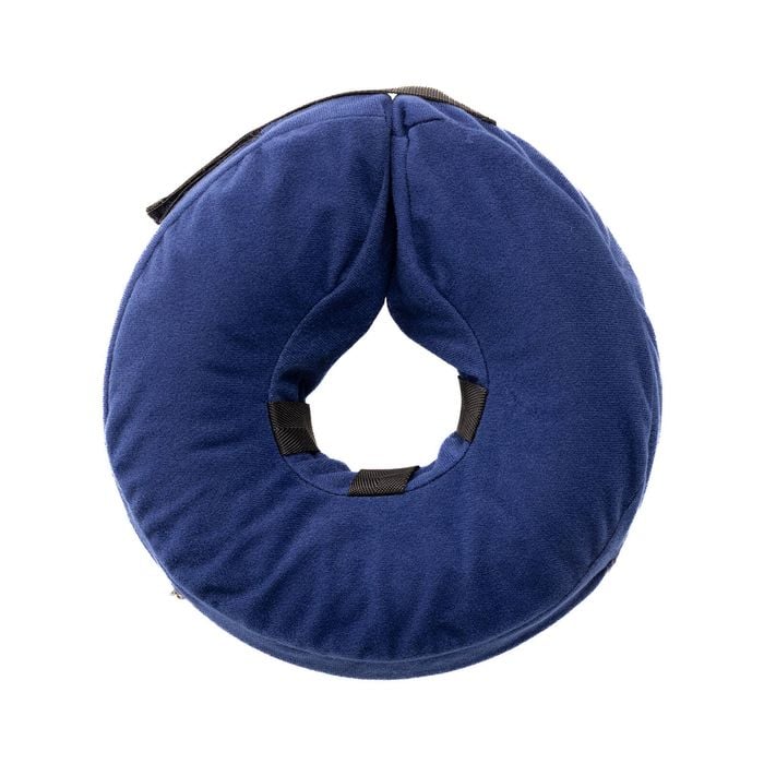 Blue neck pillow with black straps on a white background