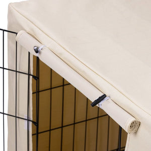Beige pet gate with black metal bars on a white background