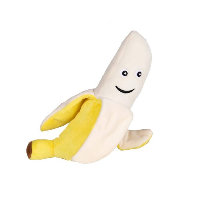 Plush toy shaped like a banana with a smiling face on a white background