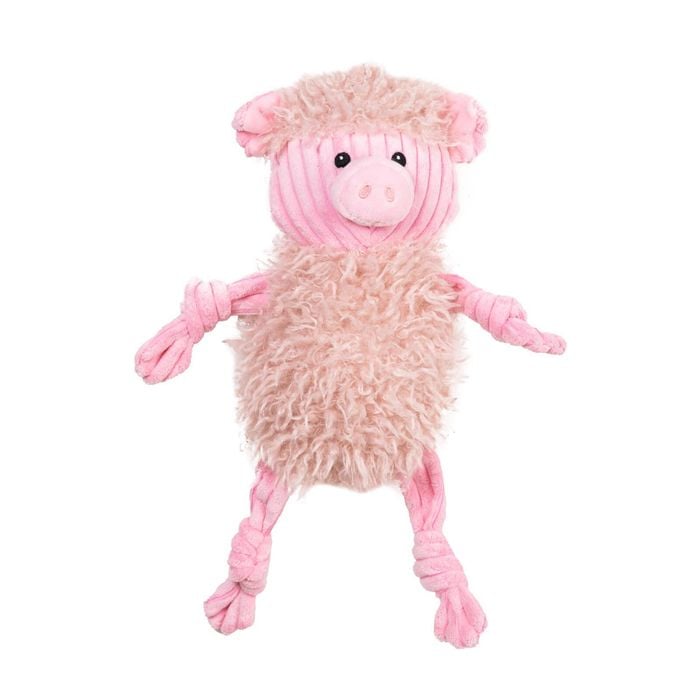 Plush toy sheep with pink fleece on a white background