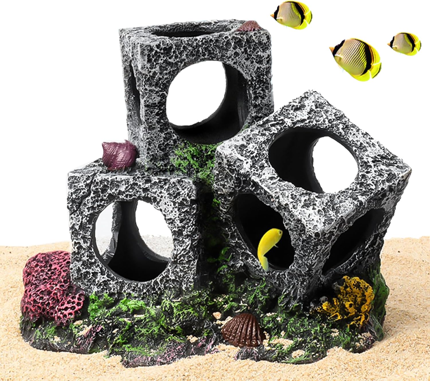 Decorative aquarium rocks with holes and fish on a sandy background at Pet Servo