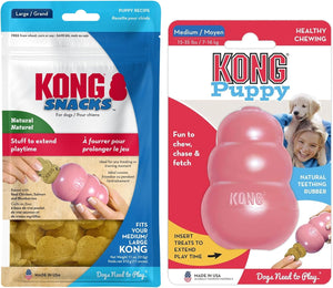 Two packages of KONG brand dog treats and a pink KONG Puppy toy shown side by side on a white background. The left package is KONG Snacks in blue packaging with a puppy photo; the right package is KONG Puppy in red packaging with a puppy photo and a pink chew toy at Pet Servo
