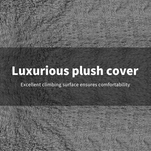 A close-up of a gray plush faux-fur or velour-like fabric texture with a dark horizontal banner across the center containing the text 'Luxurious plush cover' and smaller text below at Pet Servo