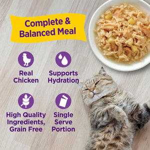 Cat lying next to a bowl of cat food with text highlighting features on a wooden surface at Pet Servo