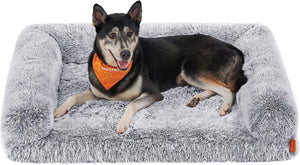 Dog lying on a gray plush pet bed with an orange bandana at Pet Servo