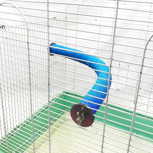Blue and purple exercise wheel inside a birdcage at Pet Servo