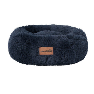 Navy blue fluffy pet bed with a brand label on a white background at Pet Servo