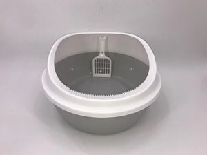 Gray cat litter box with a white scoop on a gray background at Pet Servo