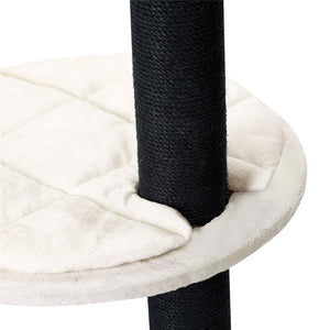 Close-up of a cat tree with a black post and white cushioned platform at Pet Servo