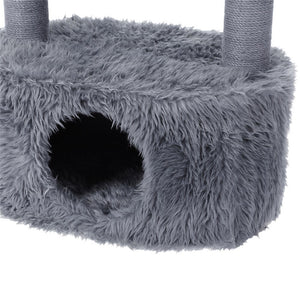Gray cat tree with a fluffy cushioned area and a dark interior at Pet Servo