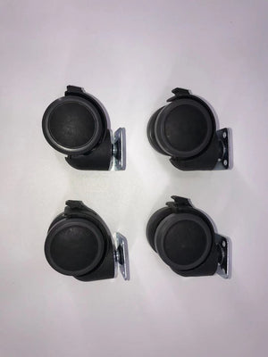 Four black caster wheels on a white background at Pet Servo