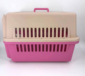 Pink and beige pet carrier on a white background at Pet Servo