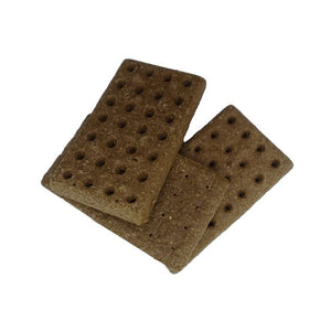 Three brown rectangular seed starting pads with holes on a white background