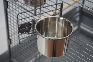 Metal water bowl attached to a wire cage at Pet Servo