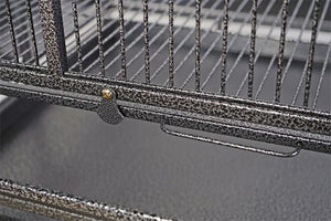 Close-up of a metal grill basket with a blurred background at Pet Servo