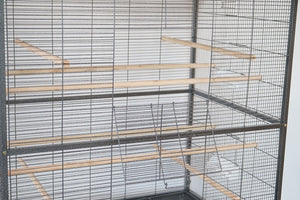 Large bird cage with wooden perches on a white background at Pet Servo