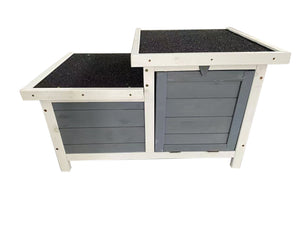 Wooden pet house with black top and gray sides on a white background at Pet Servo