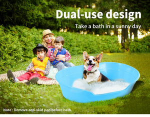 Children and a dog enjoying a bath in a portable pool on a sunny day at Pet Servo