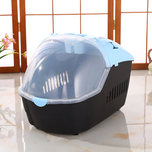 Pet carrier with a transparent dome on a tiled floor at Pet Servo