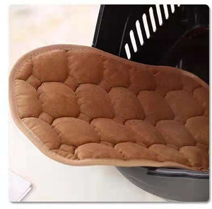 Brown quilted pot holder on a white surface at Pet Servo