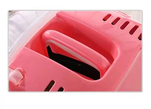 Close-up of a pink kitchen appliance with a handle at Pet Servo