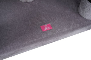 Gray car mat with a pink logo on a white background at Pet Servo