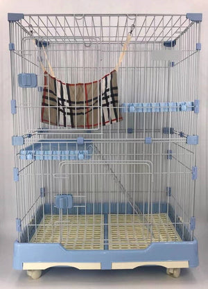 Pet cage with a checkered blanket hanging inside on a plain background at Pet Servo
