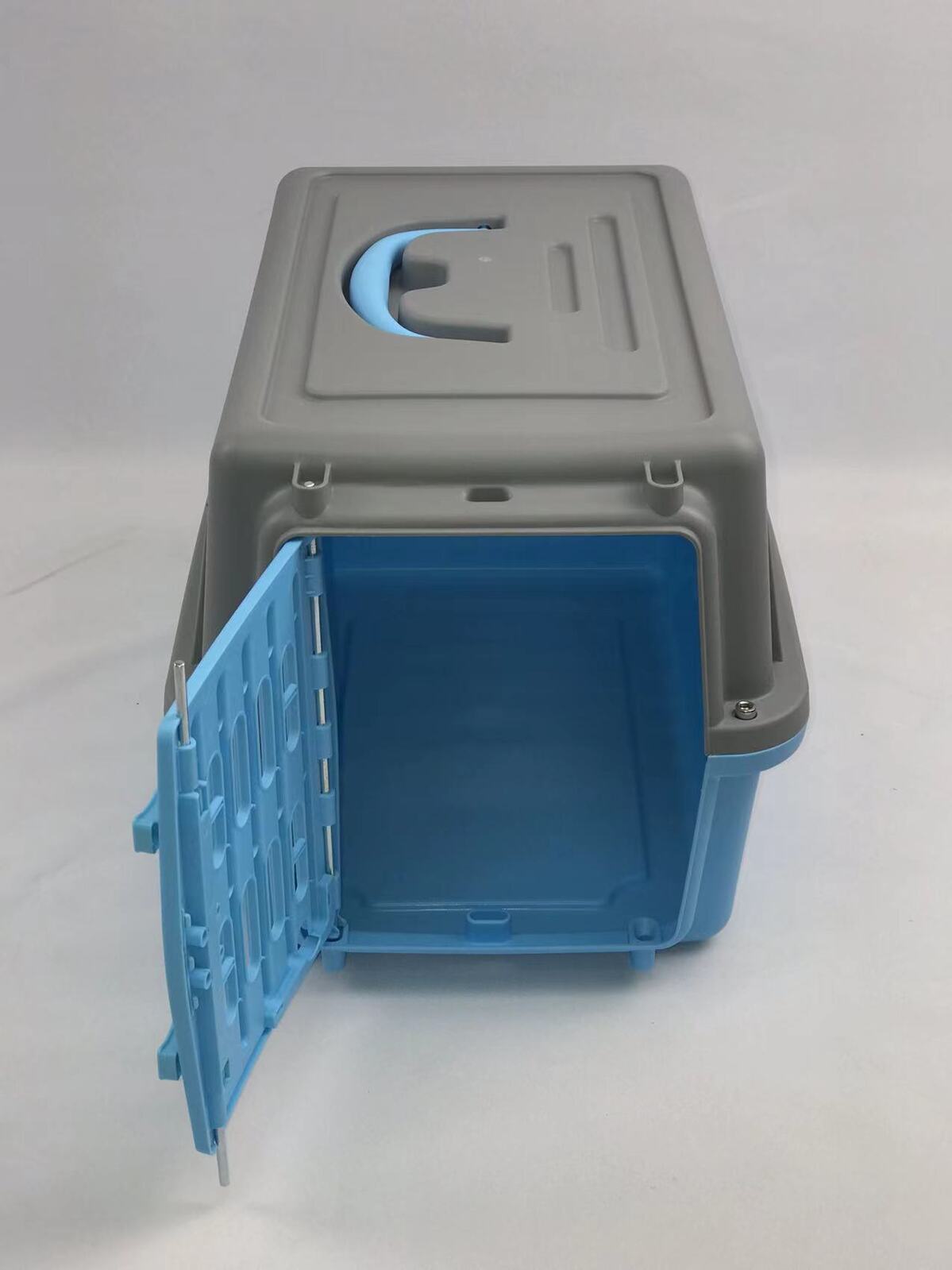 Gray and blue pet carrier with open door on a white background at Pet Servo
