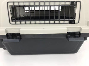 Pet carrier with a black interior and gray exterior on a white background at Pet Servo