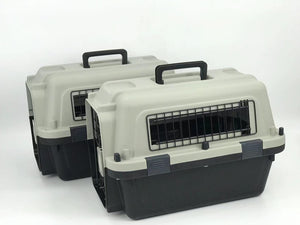 Two pet carriers with black interior grids on a white background at Pet Servo