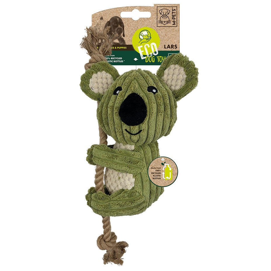 A green koala-shaped dog toy made of rope and plush fabric, hanging from a cardboard retail header. The header shows the brand Lars and the Eco Dog Toy line, with a small circular inset showing the product made from recycled dog toys at Pet Servo