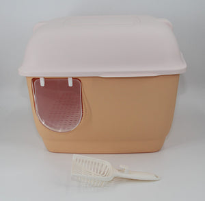 Beige pet litter box with a pink top and a white scoop on a light gray background at Pet Servo