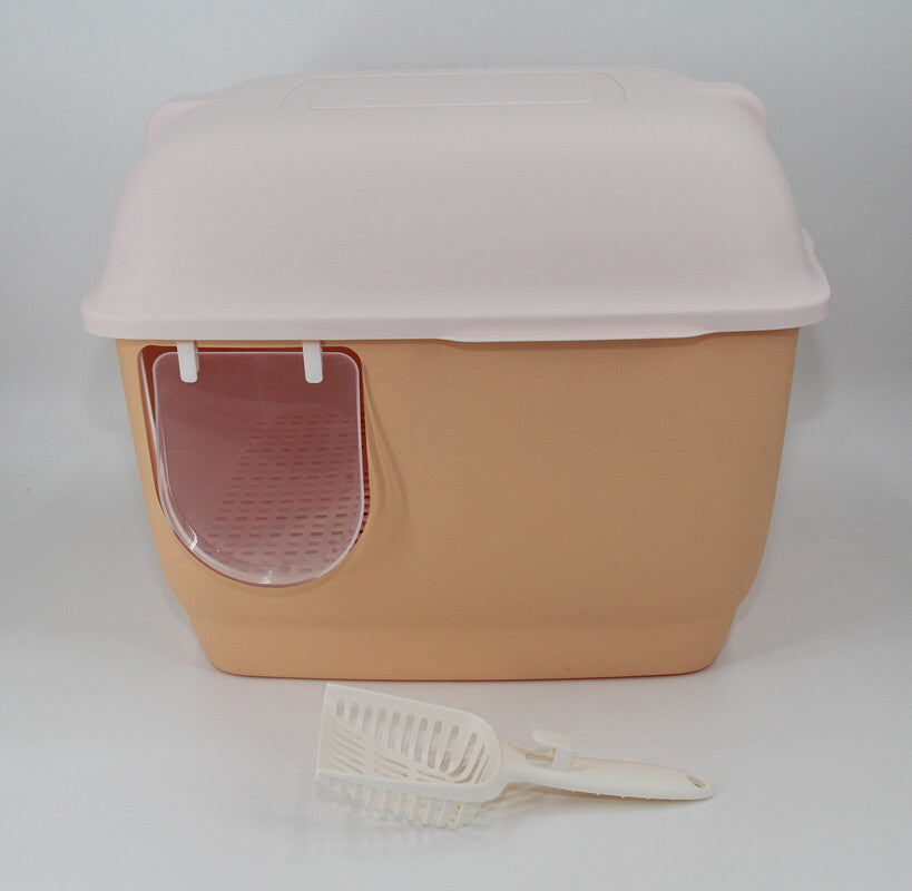 Beige pet litter box with a pink top and a white scoop on a light gray background at Pet Servo