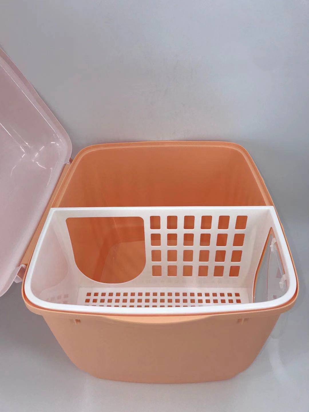 Pink pet carrier with a white interior on a light gray background at Pet Servo