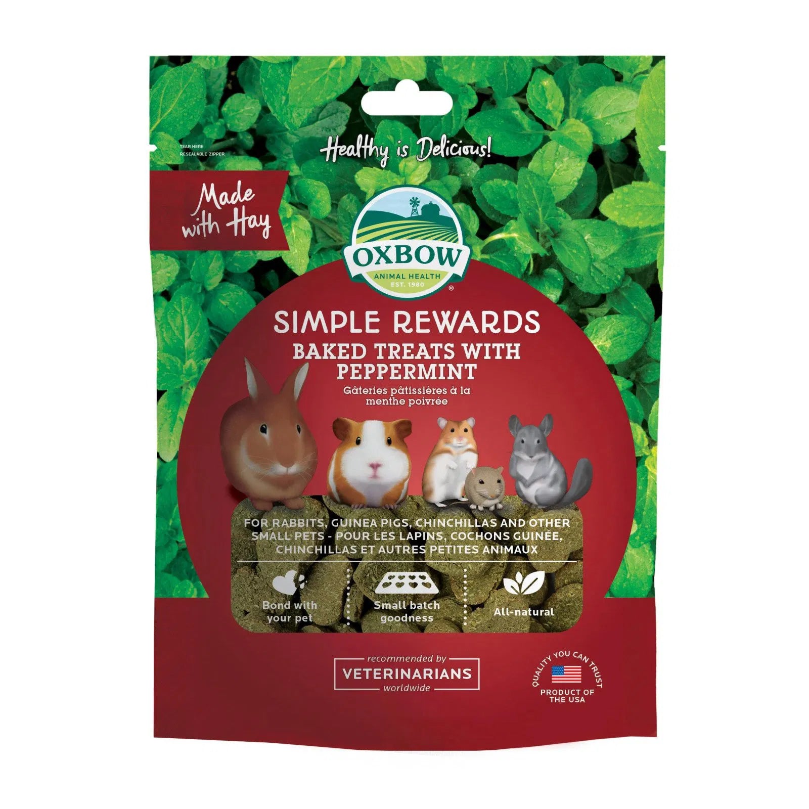Oxbow Simple Rewards baked treats packaging with green leaves in the background at Pet Servo