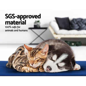 Cat and dog lying on a blue mat with SGS-approved material text at Pet Servo