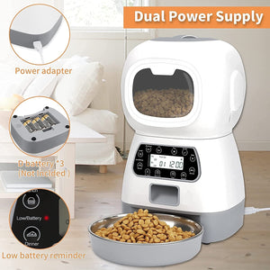 Pet food dispenser with dual power supply and bowl of food on a wooden floor at Pet Servo