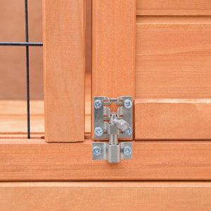 Metal hinge on a wooden door at Pet Servo