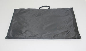 Black folded mat with handle on a white background at Pet Servo