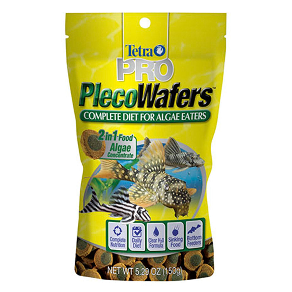 A bag of Tetra Pro Pleco Wafers complete diet for algae eaters, featuring a bright yellow package with illustrations of tropical fish and visible kelp-like food pieces at the bottom.