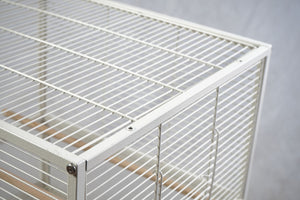 White metal grid structure on a gray background at Pet Servo