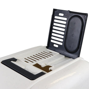 Close-up of a white appliance with black grates on a white background at Pet Servo