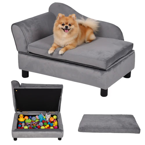 Gray pet sofa with a dog sitting on it, and a toy box with colorful toys inside at Pet Servo