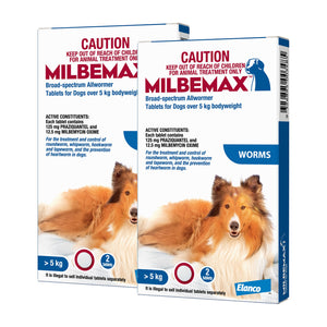 Two boxes 4 tablets of Milbemax for dogs with a dog image on the packaging at Pet Servo