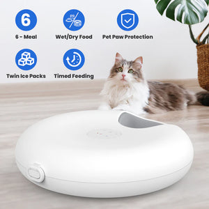 Cat sitting on a white pet feeder with features listed above it.