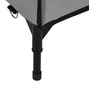 Close-up of a gray camping table with a black leg on a white background
